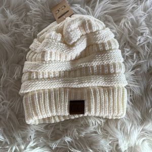 cc beanie. brand new. ivory color